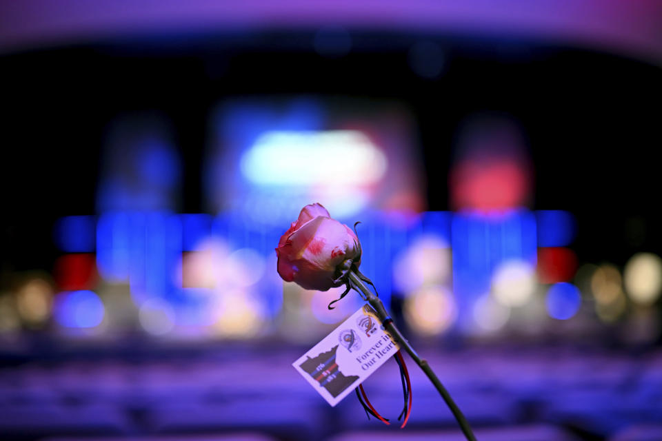 Roses are ready to be handed out to attendees of the memorial service for Burnsville police officers Paul Elmstrand, 27, Matthew Ruge and firefighter-paramedic Adam Finseth, Wednesday, Feb. 28, 2024, at Grace Church in Eden Prairie, Minn. Thousands of law enforcement officers, firefighters and paramedics are expected to pack a Minnesota church Wednesday for a memorial service for three first responders who were gunned down in the line of duty. (Aaron Lavinsky/Star Tribune via AP)