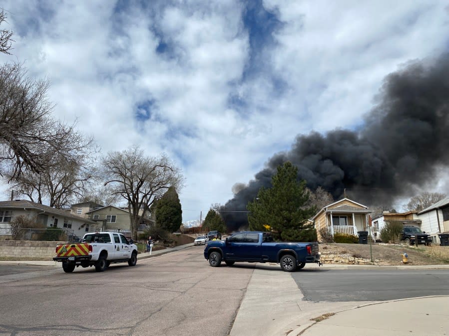 Black smoke coming from a house fire