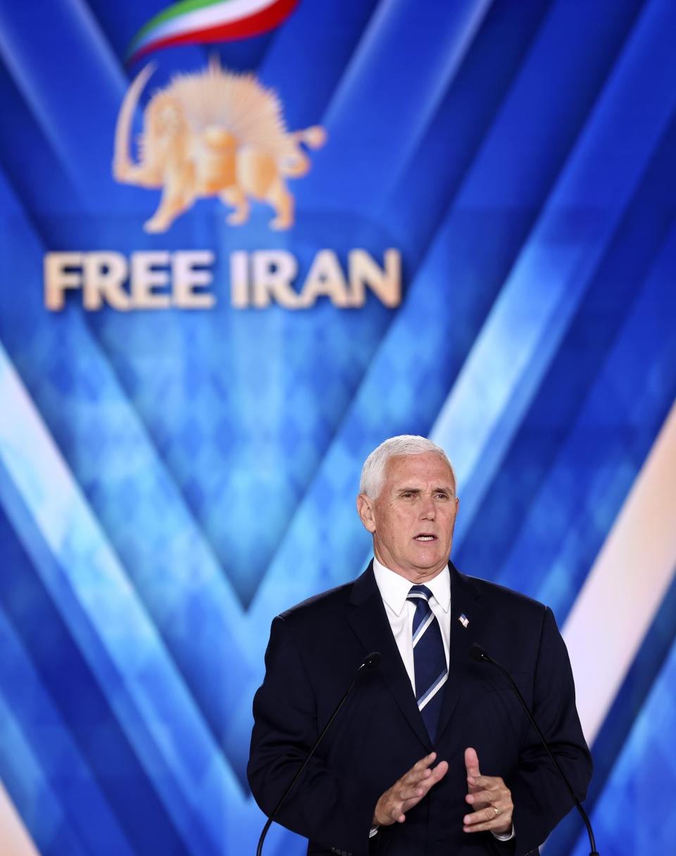 Former U.S. Vice President Mike Pence speaks at the Iranian opposition headquarters in Albania, where up to 3,000 MEK members reside at Ashraf-3 camp in Manza town, about 30 kilometers (16 miles) west of Tirana, Albania, Thursday, June 23, 2022. (AP Photo/Franc Zhurda)