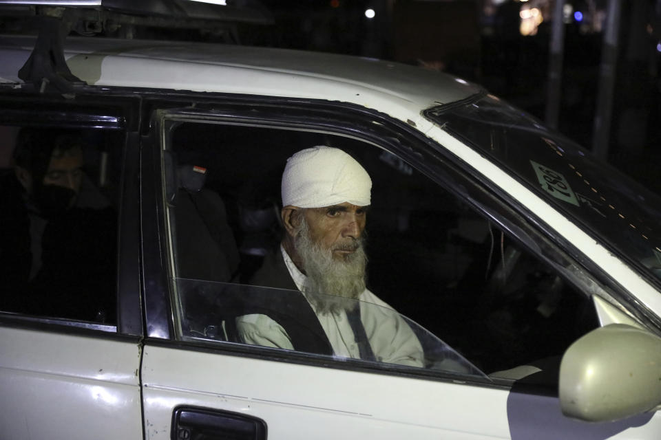 An injured man is transported to a hospital in Kabul, Afghanistan, Friday, April 30, 2021. A powerful suicide truck bombing struck a guest house in eastern Afghanistan on Friday, killing at least 14 people and wounding as many as 90, the Interior Ministry said. (AP Photo/Rahmat Gul)