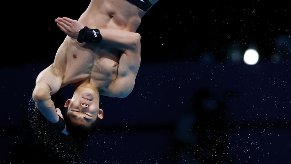 A diving competitor at the Tokyo 2020 Olympics - Credit: Bernadett Szabo/Reuters