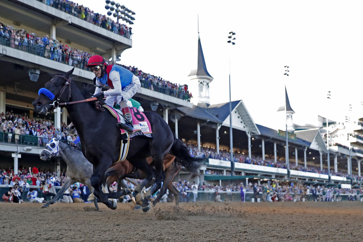 LOUISVILLE, KY - MAY 01: Medina Spirit (8) ridden by jockey John Velazquez wins the 147th Running of the Kentucky Derby on May 1, 2021 at Churchill Downs in Louisville, Kentucky. (Photo by Brian Spurlock/Icon Sportswire via Getty Images)