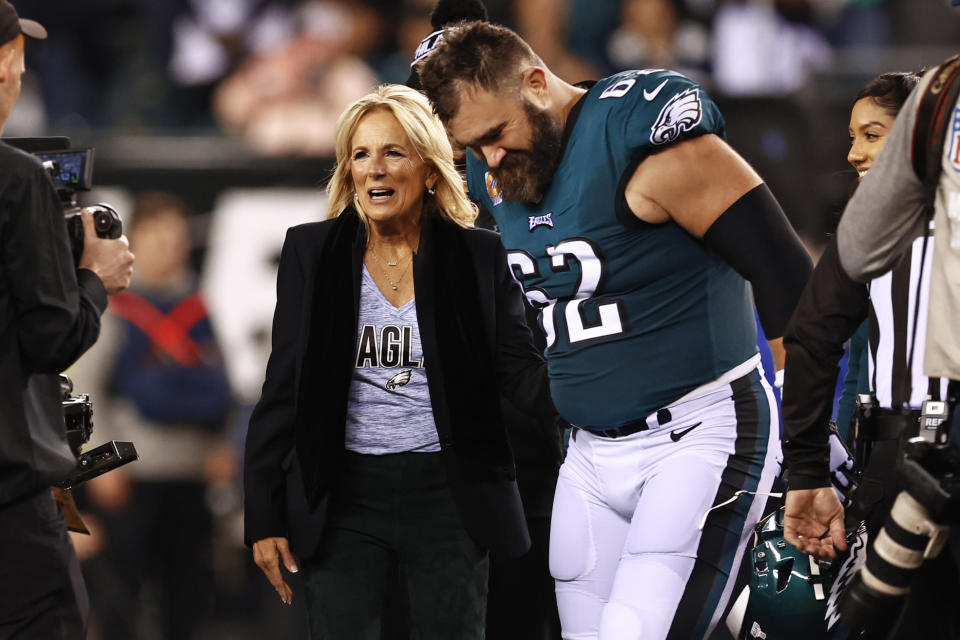 FILE - First lady Jill Biden talks with Philadelphia Eagles center Jason Kelce (62) before the coin toss before an NFL football game against the Dallas Cowboys, Oct. 16, 2022, in Philadelphia. (AP Photo/Rich Schultz, File)