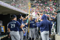 Seattle Mariners' Julio Rodriguez (44) celebrates his two-run home run against the Detroit Tigers in the ninth inning of a baseball game, Friday, May 12, 2023, in Detroit. (AP Photo/Paul Sancya)