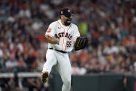 Houston Astros starting pitcher Jose Urquidy reacts after Los Angeles Angels' Luis Rengifo lined out to end the top of the sixth inning of a baseball game Saturday, July 2, 2022, in Houston. (AP Photo/David J. Phillip)