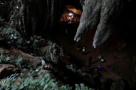 Rescue workers are seen in Tham Luang caves during a search for 12 members of an under-16 soccer team and their coach, in the northern province of Chiang Rai, Thailand, June 27, 2018. REUTERS/Soe Zeya Tun