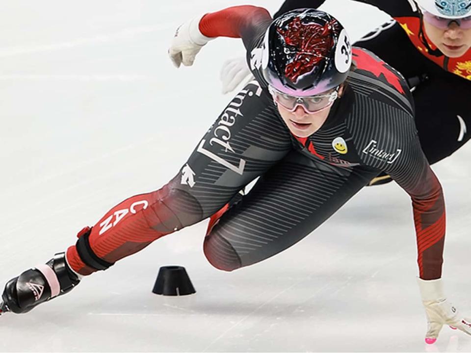 Kim Boutin, a three-time medallist in short track at the 2018 Olympics, is among three veteran speed skaters returning to the Canadian team for the Winter Games in Beijing in February. (Lintao Zhang/Getty Images/File - image credit)