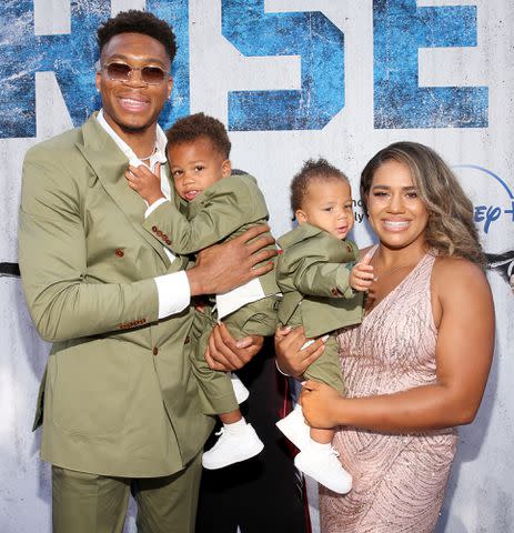 Jesse Grant/Getty Giannis Antetokounmpo and Mariah Riddlesprigger with their two sons in June 2022.