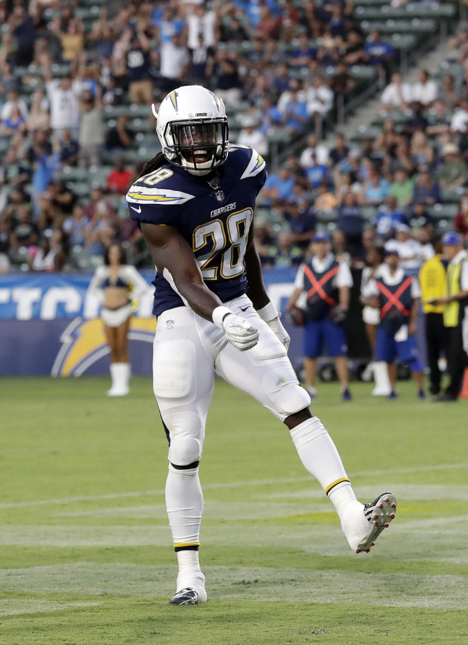 Los Angeles Chargers running back Melvin Gordon celebrates after scoring a rushing touchdown against the Seattle Seahawks during the first half of an NFL preseason football game Saturday, Aug. 18, 2018, in Carson, Calif. (AP Photo/Gregory Bull)