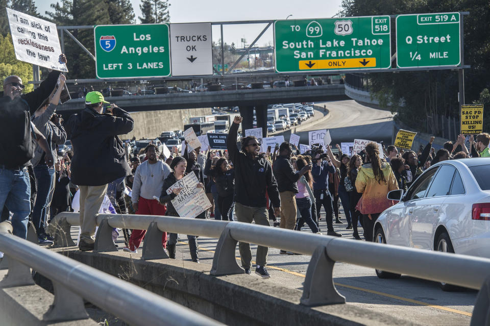 <p>Hundreds of protesters demonstrating against the fatal police shooting of Stephon Clark shut down Interstate 5 in both directions in downtown Sacramento at the height of the afternoon commute. (Photo: Renée C. Byer/Sacramento Bee via ZUMA Wire) </p>