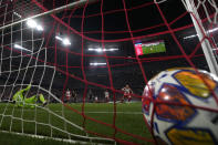 Bayern's Harry Kane, right, scores his side's second goal during the Champions League semifinal first leg soccer match between Bayern Munich and Real Madrid at the Allianz Arena in Munich, Germany, Tuesday, April 30, 2024. (AP Photo/Matthias Schrader)