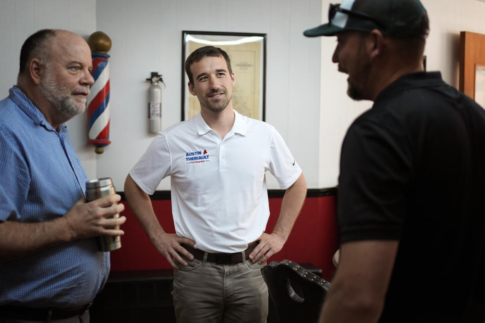 Maine Rep. Austin Theriault, R-Fort Kent, center, a former NASCAR driver, campaigns for Maine's 2nd Congressional District, Wednesday, June 5, 2024, in Farmington, Maine. Theriault is running against Rep. Mike Soboleski, R-Phillips, in the Maine primary on Tuesday, June 11. The winner will face Democrat U.S. Rep. Jared Golden in November. (AP Photo/Robert F. Bukaty)