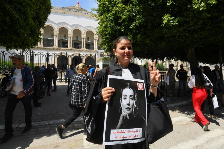 Lawyers carrying placards rally in front of the Tunis Court on May 13, 2024 (FETHI BELAID)