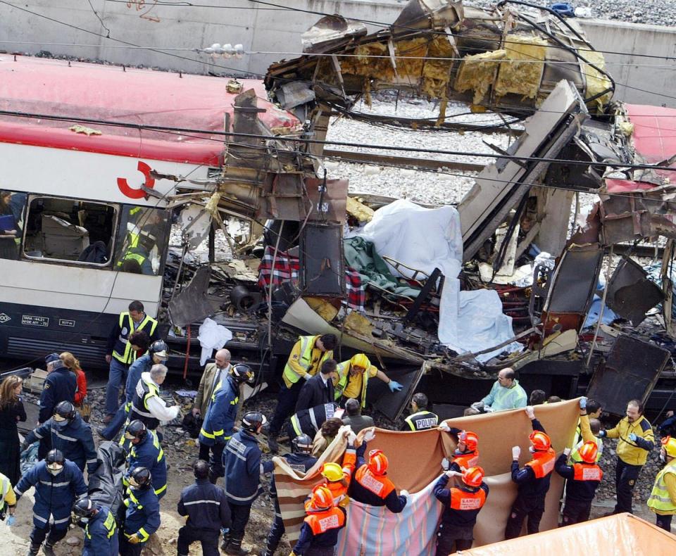 Emergency services at the scene of the Madrid train bombing disaster in 2004 (AFP/Getty)