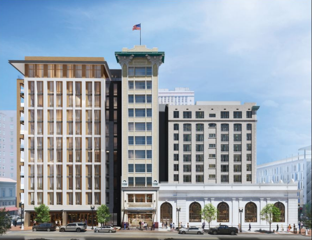 The view in this rendering shows the proposed 11-story apartment building as seen from along Laura Street next to the three Laura Street Trio buildings.