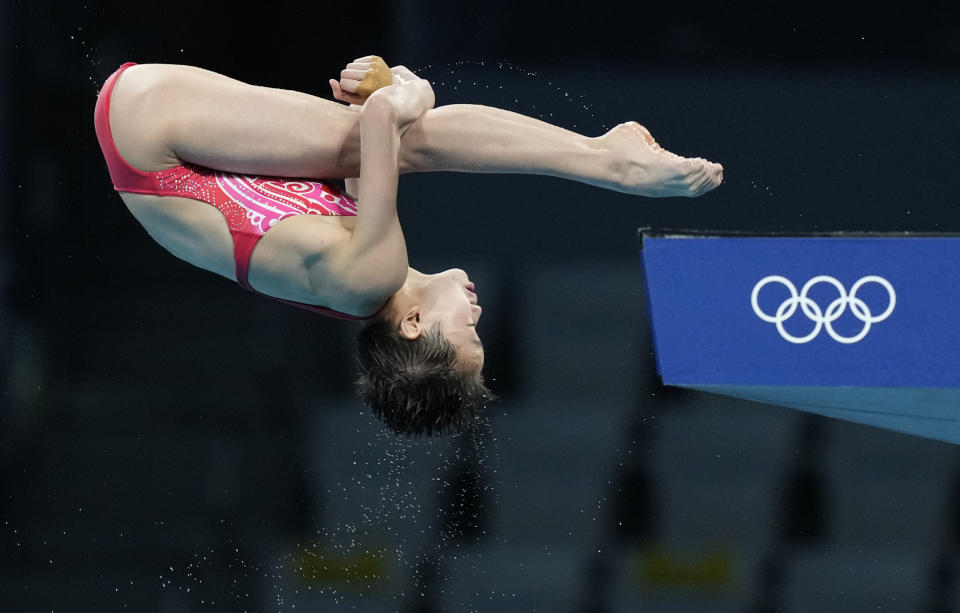 Quan Hongchan of China competes in women's diving 10m platform final at the Tokyo Aquatics Centre at the 2020 Summer Olympics, Thursday, Aug. 5, 2021, in Tokyo, Japan. (AP Photo/Dmitri Lovetsky)