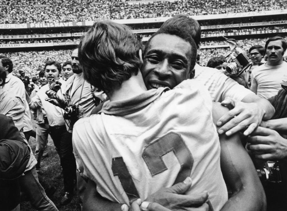 Pele embraces goalkeeper Ado after Brazil’s joyful dismantling of Italy in the 1970 World Cup final (Getty)