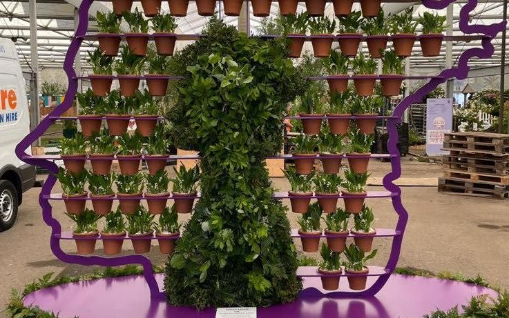 A floral sculptural portrait of Queen Elizabeth II 