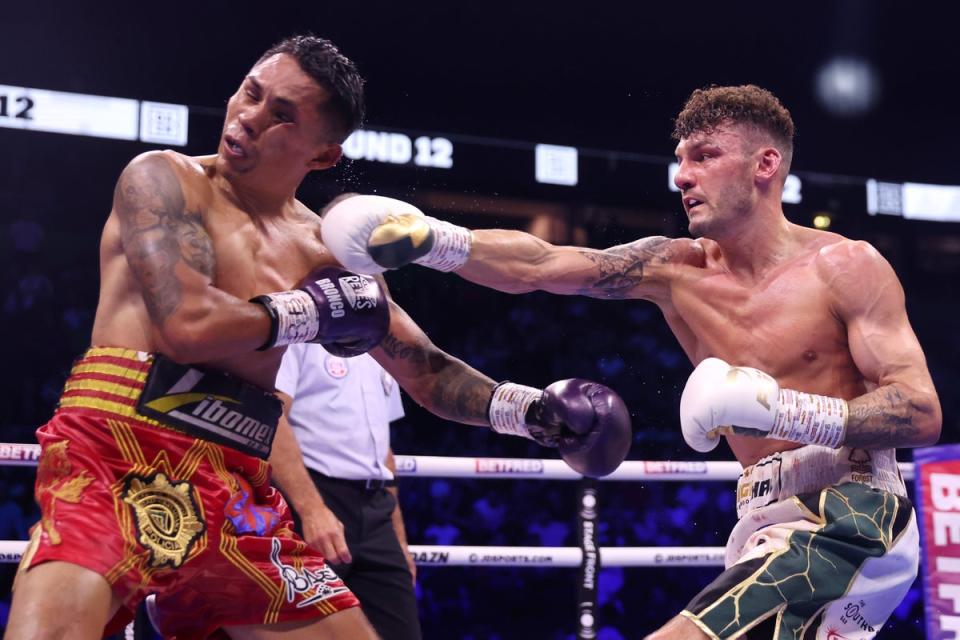 Wood (right) knocked down Lara en route to a decision victory (Getty Images)