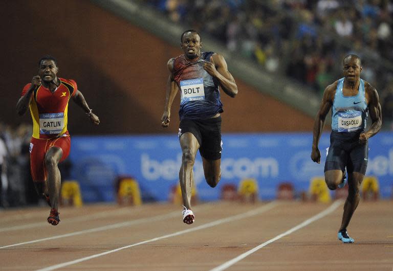 Justin Gatlin (left) Usain Bolt (centre) and Britain's James Dasaolu compete in the 100m race at the Diamond League athletics meeting on September 6, 2013, in Brussels