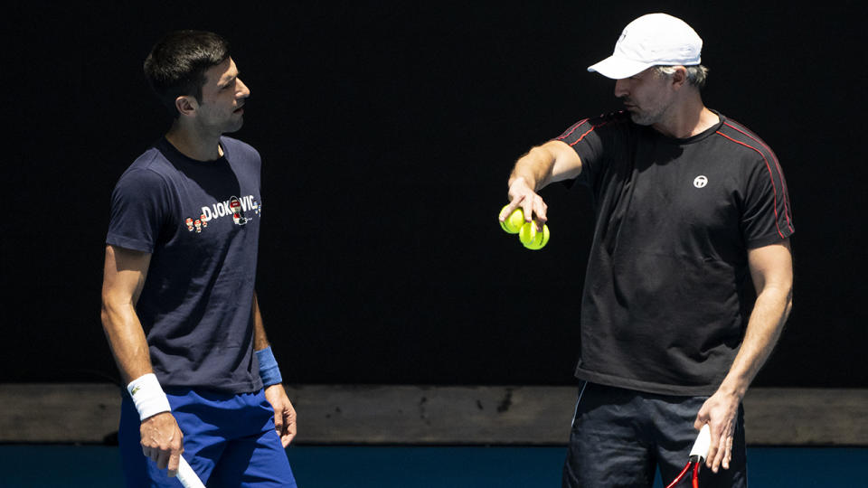 Novak Djokovic, pictured here speaking to coach Goran Ivanisivic during a practice session ahead of the Australian Open. 