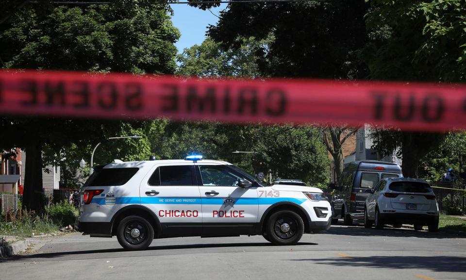 A police car at the scene of a shooting in Chicago's South Side on Tuesday, June 15, 2021. <span class="copyright">Teresa Crawford—AP</span>