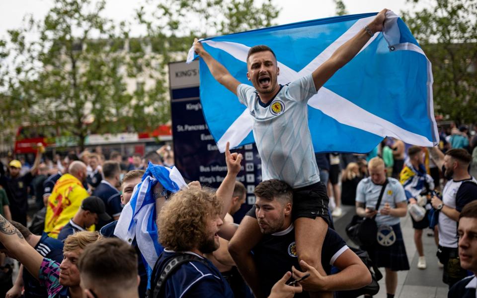 Scotland fans arrive at King's Cross - GETTY IMAGES