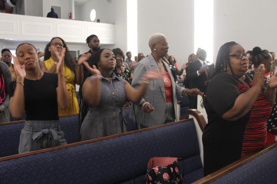 Parishioners praise the Lord during the 2023 Founders' Day service Sunday at PASSAGE Family Church in NE Gainesville.
(Credit: Photo by Voleer Thomas/For The Guardian)