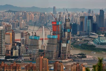 FILE PHOTO: A general view of a shopping mall under construction in Chongqing, China July 13, 2017. REUTERS/Stringer/File Photo