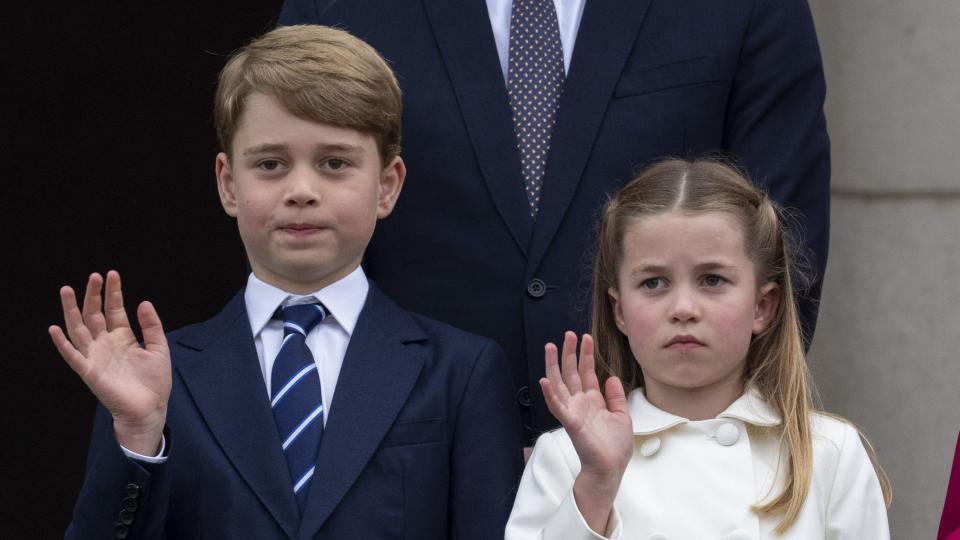 LONDON, ENGLAND - JUNE 05: Prince George of Cambridge and Princess Charlotte of Cambridge stand on the balcony at Buckingham Palace at the end of the Platinum Pageant on The Mall on June 5, 2022 in London, England. The Platinum Jubilee of Elizabeth II is being celebrated from June 2 to June 5, 2022, in the UK and Commonwealth to mark the 70th anniversary of the accession of Queen Elizabeth II on 6 February 1952. (Photo by Mark Cuthbert/UK Press via Getty Images)