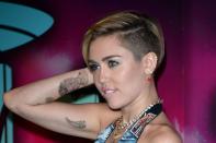 <p>The singer's right arm is full of ink by famous artist, Kat Von D. On her right bicep, Miley has a drawing of a <a href="http://www.popstartats.com/miley-cyrus-tattoos/mc-arm/claw/" rel="nofollow noopener" target="_blank" data-ylk="slk:curved claw;elm:context_link;itc:0;sec:content-canvas" class="link ">curved claw</a>. Though she hasn't shared what it's for, we assume that it has something to do with her love for animals. </p><p>She also got a very <a href="https://www.eonline.com/news/477694/miley-cyrus-reveals-grandma-inspired-tattoo-get-the-scoop" rel="nofollow noopener" target="_blank" data-ylk="slk:special tat;elm:context_link;itc:0;sec:content-canvas" class="link ">special tat</a> by Kat back in 2013 — a portrait of her "Mammie." Miley posted a pic of the tat on Twitter and wrote, "Because I am her favorite & she is mine." So sweet! </p>