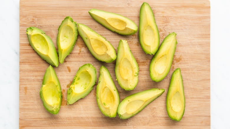 avocados on chopping board