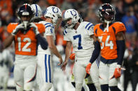 Indianapolis Colts place kicker Chase McLaughlin (7) celebrates his field goal with punter Matt Haack (6) in overtime during an NFL football game, against the Denver Broncos Thursday, Oct. 6, 2022, in Denver. (AP Photo/Jack Dempsey)