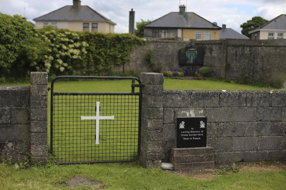 FILE - This June 4, 2014 file photo shows the site of a mass grave for children who died in the Tuam mother and baby home, in Tuam, County Galway, Ireland. The Vatican has indicated its support for a campaign to exhume the bodies of hundreds of babies who were buried on the grounds of a Catholic-run Irish home for unwed mothers to give them a proper Christian burial. The Vatican’s ambassador to Ireland, Archbishop Jude Thaddeus Okolo, said in a July 15, 2020 letter to the amateur Irish historian behind the campaign that he shared the views of the archbishop of Tuam, Ireland, Michael Neary, who has said it was a “priority” for him to re-inter the bodies in consecrated ground.(Niall Carson/PA via AP, file)