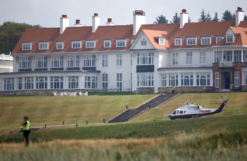 FILE PHOTO: A police officer stands in the grounds of the golf resort owned by U.S. President Donald Trump, during Trump's stay at the resort, in Turnberry