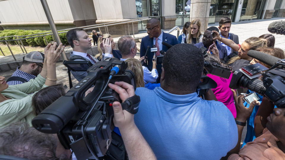 Beth Holloway's spokesman George Seymore talks with the media at the Hugo L. Black United States Courthouse, Friday, June 9, 2023, in Birmingham, Ala. Joran van der Sloot, the chief suspect in the 2005 disappearance of Natalee Holloway, was arraigned in federal court on charges related to extorting money from Holloway's mother. (AP Photo/Vasha Hunt)