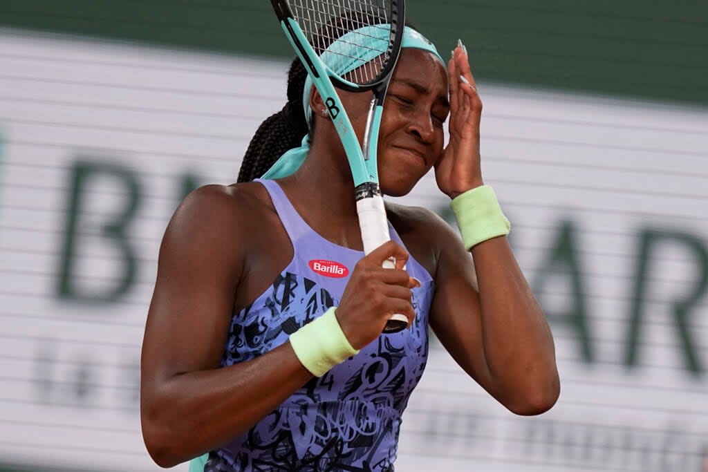 Coco Gauff of the U.S. reacts after missing a shot against Poland’s Iga Swiatek during the final match at the French Open tennis tournament in Roland Garros stadium in Paris, France, Saturday, June 4, 2022. (AP Photo/Michel Euler)