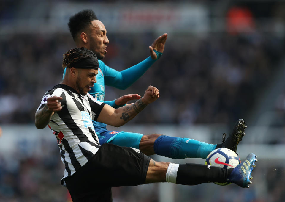 Newcastle’s DeAndre Yedlin battles with Arsenal’s Pierre-Emerick Aubameyang. (Reuters)