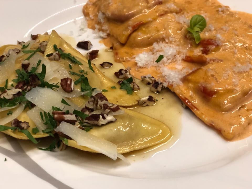 trader joe's ravioli section next to prepared raviolis on plate