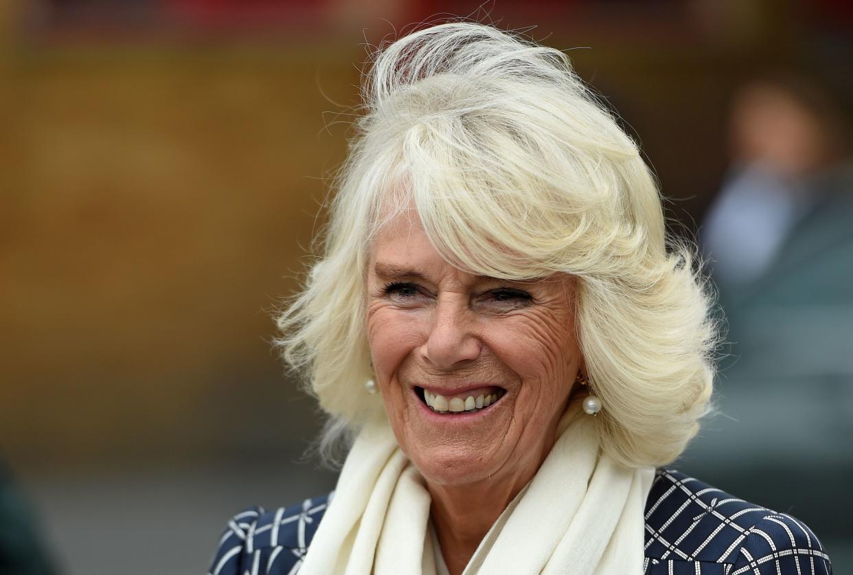 Britain's Camilla, Duchess of Cornwall reacts as she meets with firefighters, staff from Great Western Hospital, and paramedics from South Western Ambulance Service during her visit to Swindon Fire Station in Swindon, west of London on July 6, 2020. - Britain has suffered the deadliest coronavirus outbreak in Europe, reporting more than 44,000 deaths among patients who have tested positive. Infection rates have fallen significantly but experts warn the virus remains in circulation. (Photo by Eddie MULHOLLAND / POOL / AFP) (Photo by EDDIE MULHOLLAND/POOL/AFP via Getty Images)