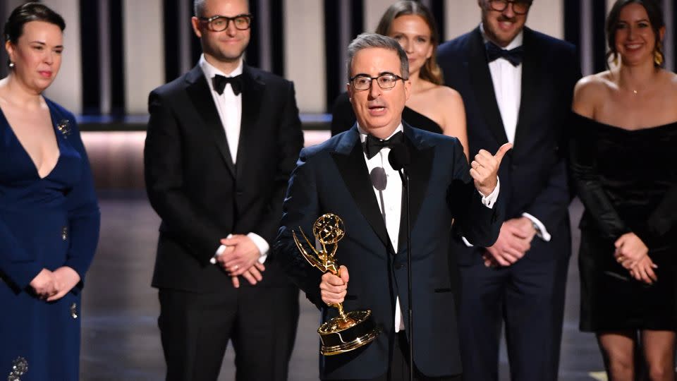 John Oliver, winner of outstanding scripted variety series with "Last Week Tonight with John Oliver," speaks onstage at Monday's Emmy Awards. - Valerie Macon/AFP/Getty Images