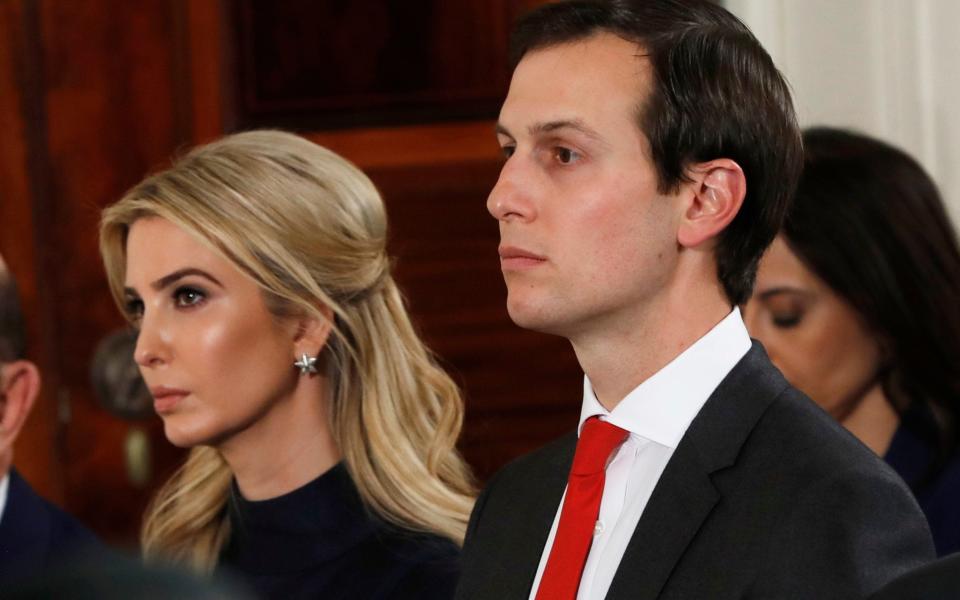 Jared Kushner, pictured with his wife Ivanka Trump, is a White House senior adviser   - AP