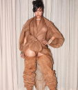 <p>Singer Rihanna has made a statement at Coachella arriving to the music festival in a sheer see-through dress, paired with matching tan suede thigh-high boots.</p>