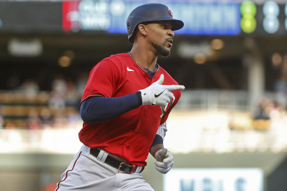 Minnesota Twins' Byron Buxton runs the bases on a solo home run against the Cleveland Guardians during the first inning of a baseball game Friday, May 13, 2022, in Minneapolis. (AP Photo/Bruce Kluckhohn)