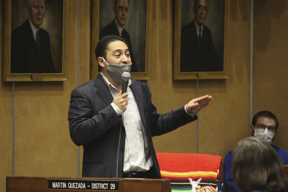 FILE - In this May 8, 2020, file photo Democratic state Sen. Martin Quezada urges speaks at the state Capitol in Phoenix. Arizona and Texas are both in the final stages of work on contentious pieces of state legislation to tighten voting laws. Quezada, a Latino from Phoenix, didn't back down. “This will hurt my community. This will hurt my neighborhood.” (AP Photo/Bob Christie, File)