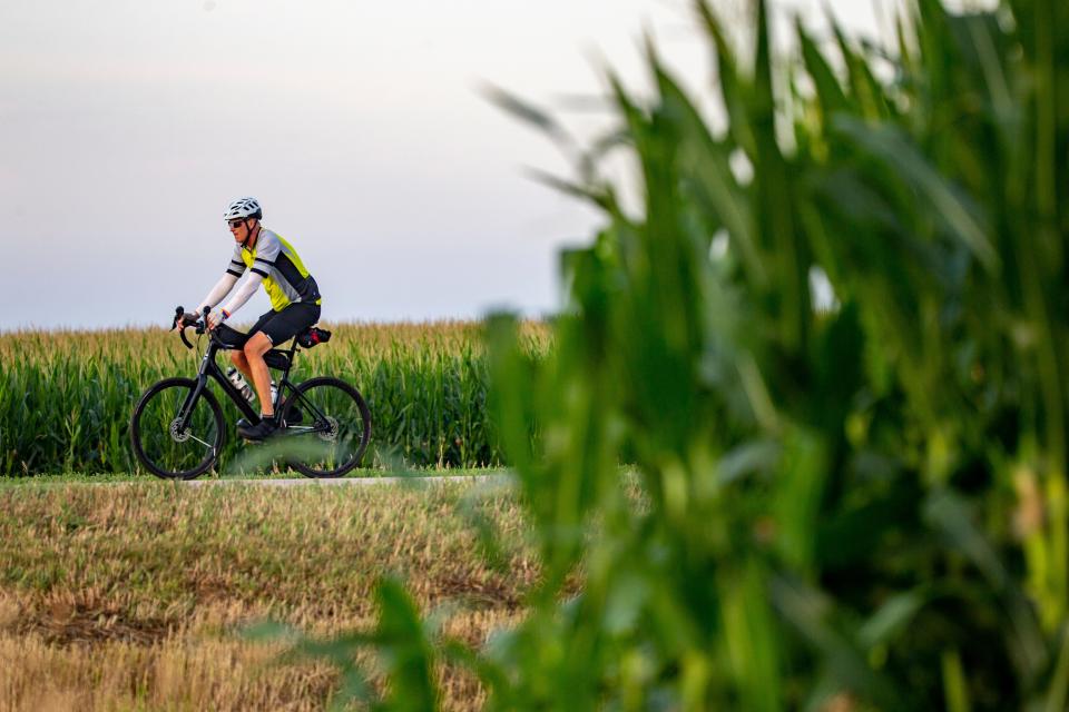 Cyclists make their way along the route to Ida Grove during the first day of RAGBRAI Sunday, July 24, 2022.