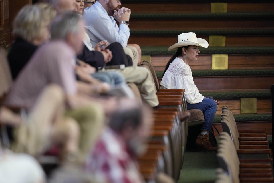 Ticketed members of the public listen to testimony during the impeachment trial for suspended Texas Attorney General Ken Paxton in the Senate Chamber at the Texas Capitol, Thursday, Sept. 14, 2023, in Austin, Texas. (AP Photo/Eric Gay)