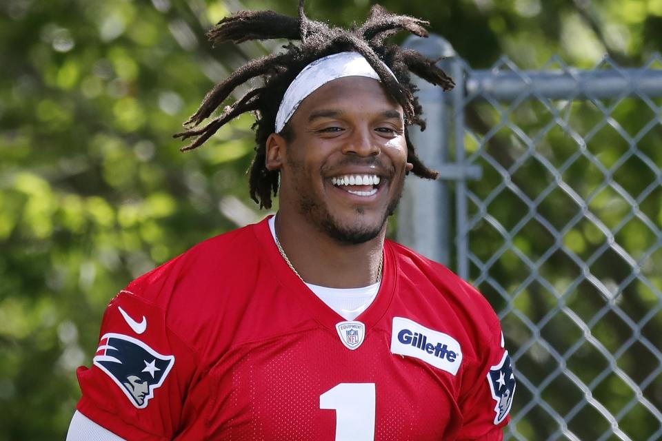 New England Patriots quarterback Cam Newton walks to the field for an NFL football training camp practice, Friday, Aug. 21, 2020, in Foxborough, Mass. (AP Photo/Michael Dwyer, Pool)