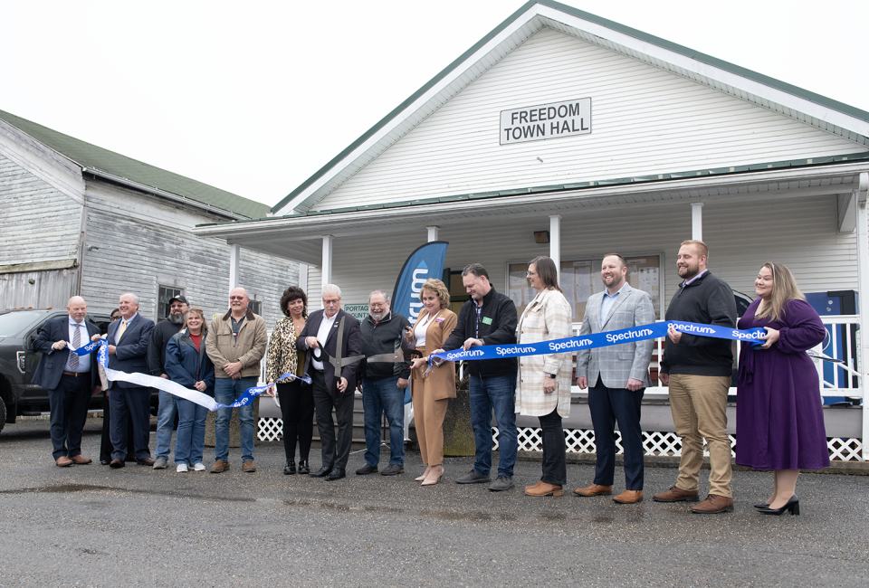 Officials with Portage County and Spectrum Charter Communications celebrate the expansion of broadband internet service during an event Jan. 25 in Freedom Township.