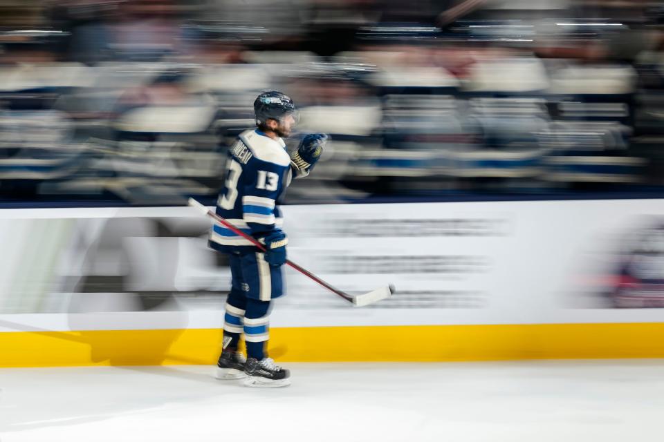 Apr 16, 2024; Columbus, Ohio, USA; Columbus Blue Jackets left wing Johnny Gaudreau (13) gets high fives from the bench after scoring a goal during the second period of the NHL hockey game against the Carolina Hurricanes at Nationwide Arena.